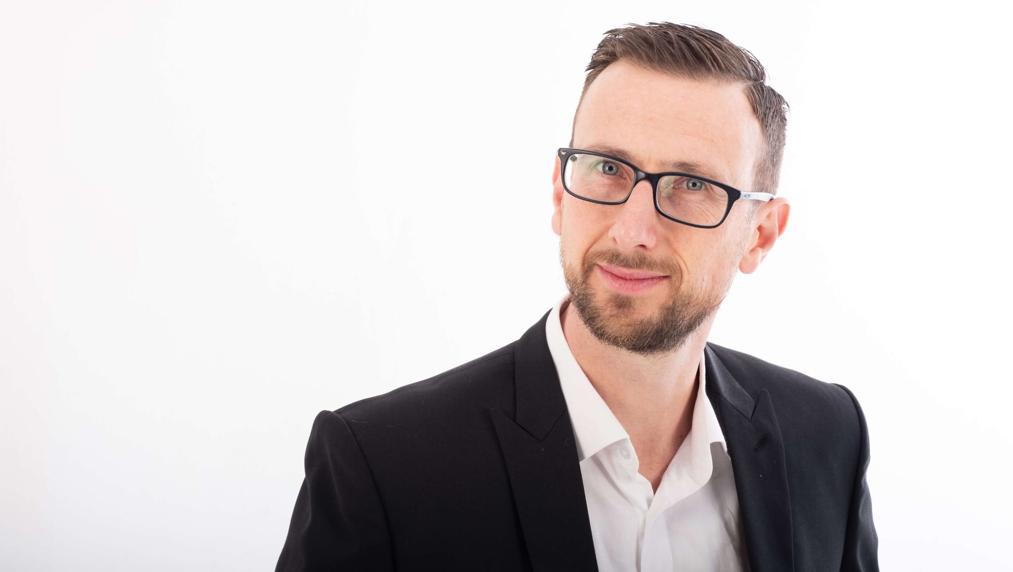 White background studio headshot of Close Up Chris, a magician in Birmingham