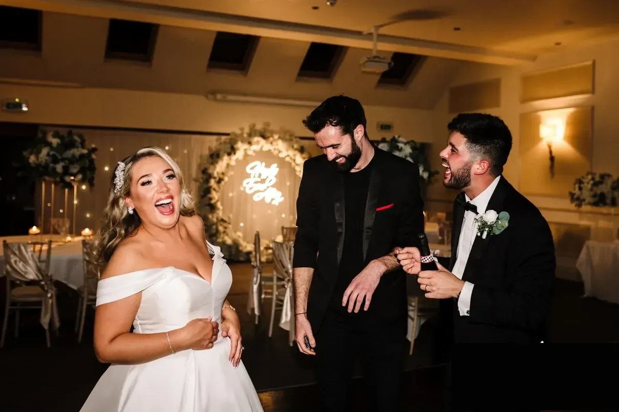 Jack Shields performing magic to bride and groom at Lancashire wedding