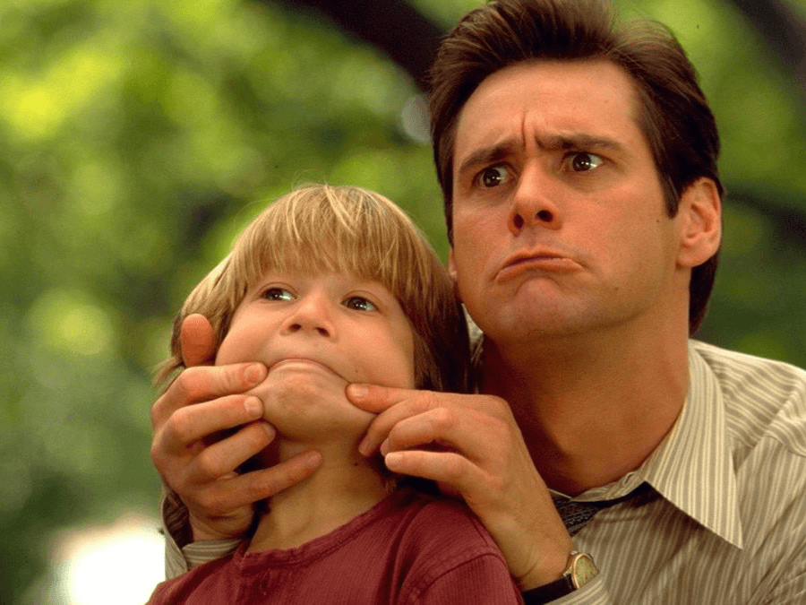 Fram from the movie Liar Liar with Jim Carey making a sad face and pulling son's face to look the same